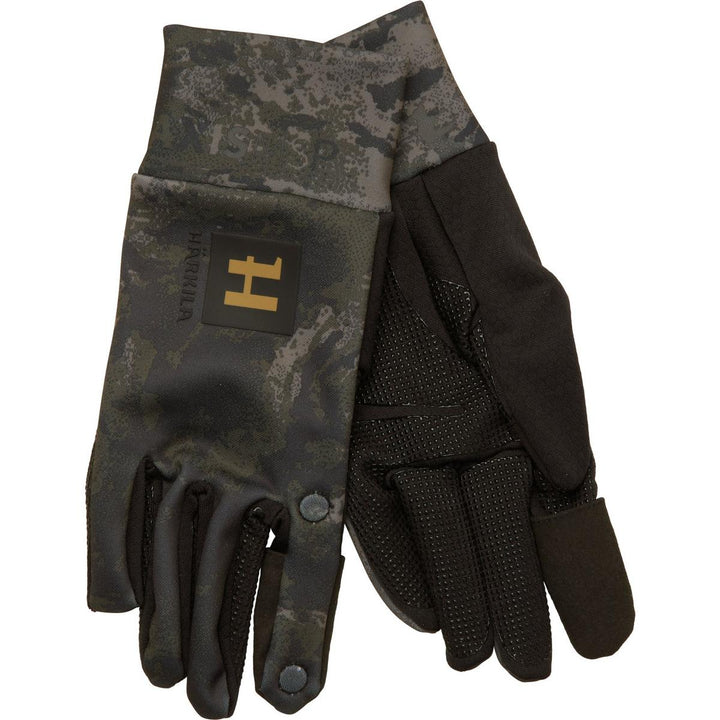 Pair of Harkila NOCTYX fleece gloves in AXIS MSP camo laid flat: back of one hand with the gold H logo, palm of the other showing black grippy print and the foldback trigger finger.