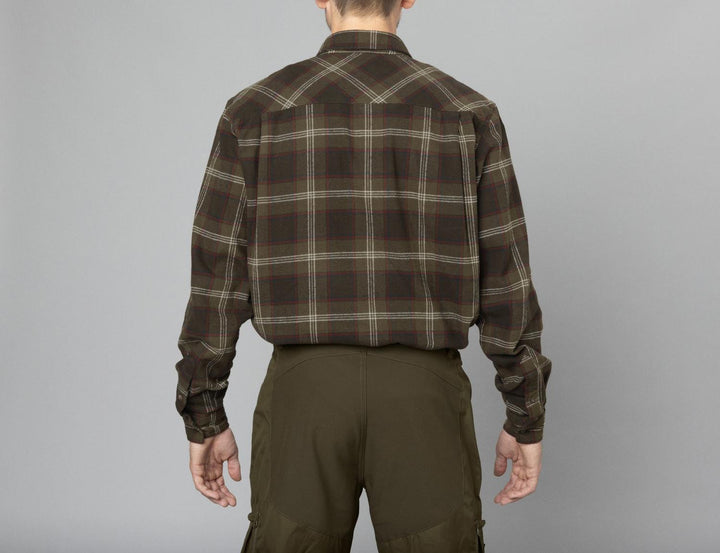 Model wearing the Seeland Glen flannel shirt, back view from the waist up showing the yoke and cuffs