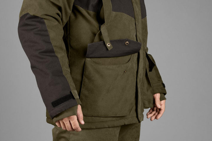 Close-up of the popper-fastened chest pocket flap on the Seeland Taiga jacket, worn