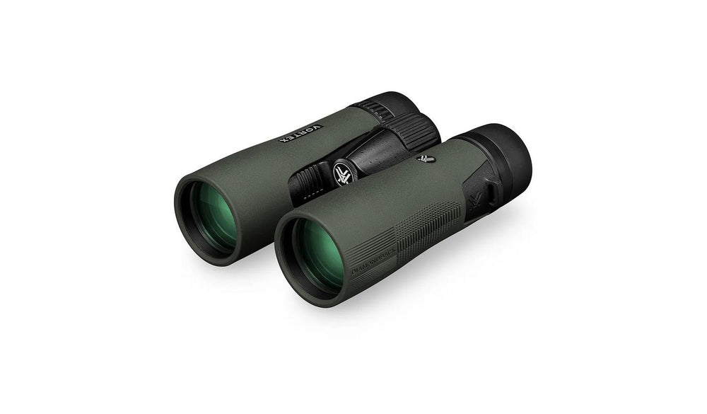 Vortex Diamondback HD 10x42 binoculars lying at an angle, three-quarter view of the green-coated objective lenses and textured green armour.