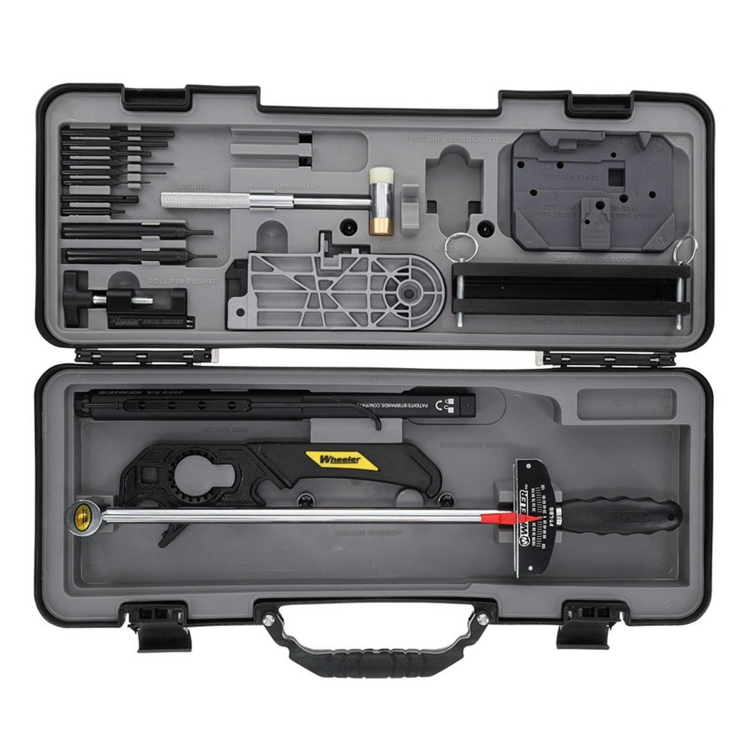 Wheeler Delta Series Pro AR-15 armourer's kit shown open, black hard case with moulded foam holding punches, wrenches, a torque wrench and vice blocks