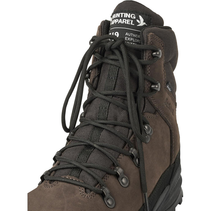 Close-up of the front lacing hooks and brand tag on the Seeland Enduro Explore Mid boot