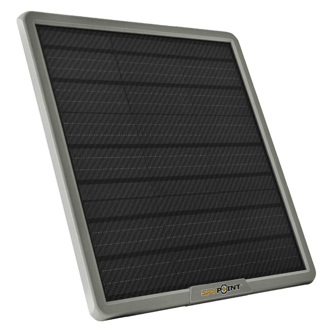 Spypoint solar panel in a green housing shown at an angle, three-quarter view of the panel face and moulded frame