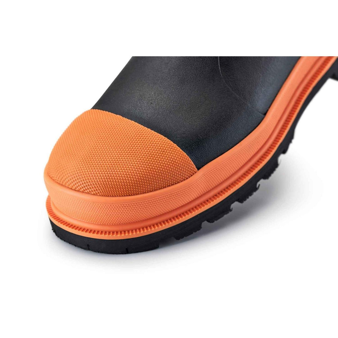Close-up of orange non-metallic safety toe cap on black Grubs Ceramic 5.0 S5 safety wellington boot