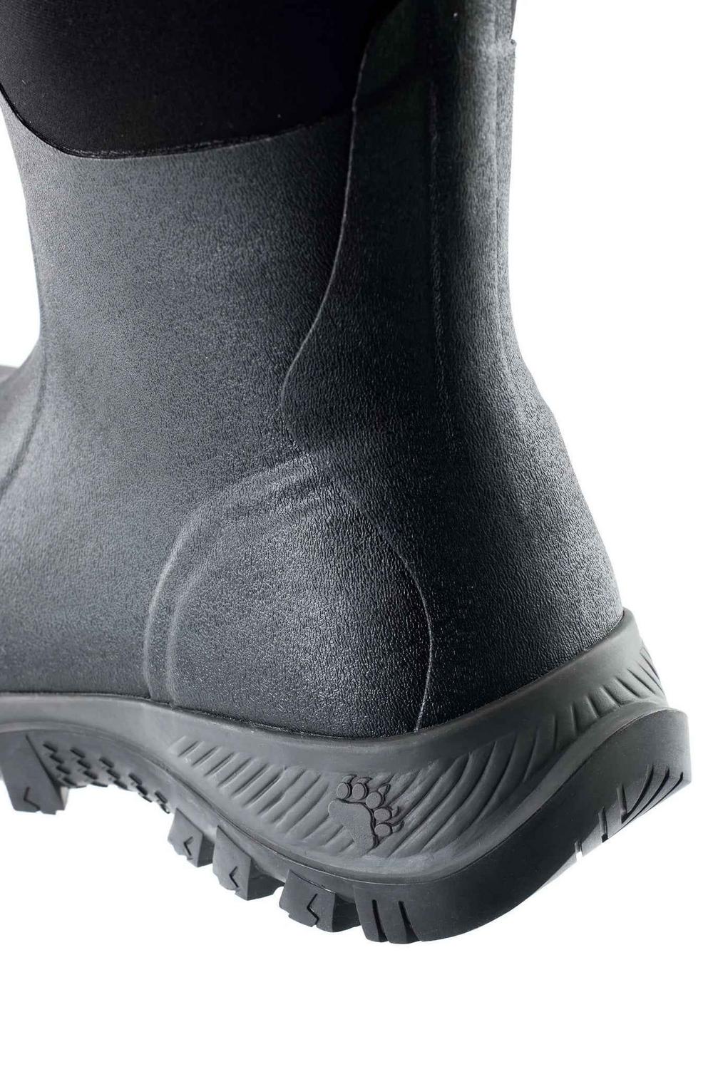 Rear view of the heel and lower shaft of a black Grubs Bearline 8.5 wellington boot with paw print on the sole edge