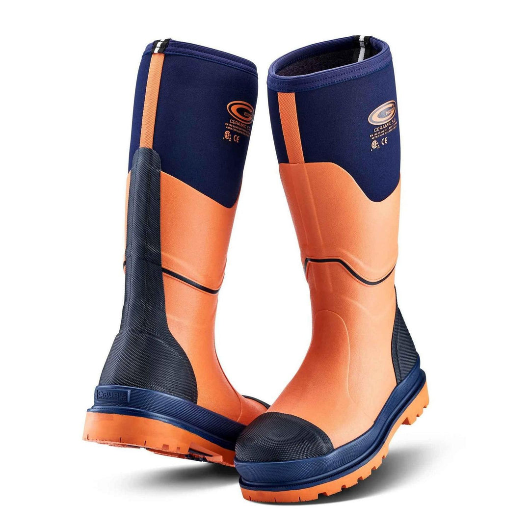 Grubs Ceramic 5.0 S5 non-metallic safety wellington boots in navy blue and orange with orange toe cap and navy sole trim, pair three-quarter view