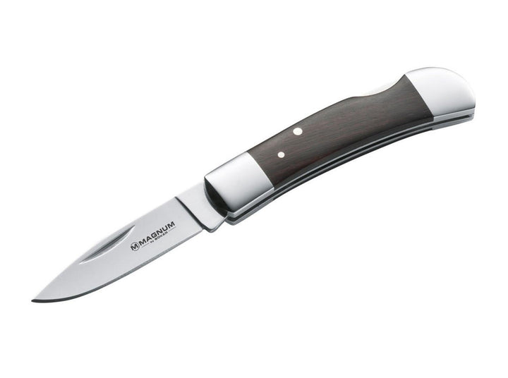 Böker Magnum Jewel folding knife with dark wood handle, polished steel bolsters and Magnum-marked blade, open side view