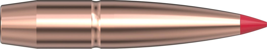 Hornady 25 Cal .257 112gr CX monolithic copper bullet lying horizontally, showing the grooved drive bands along the shank and a red polymer tip