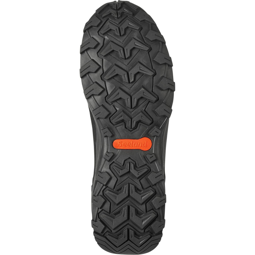 Sole of the Seeland Enduro Explore Mid boot shown from below, with the orange Seeland logo on the black tread