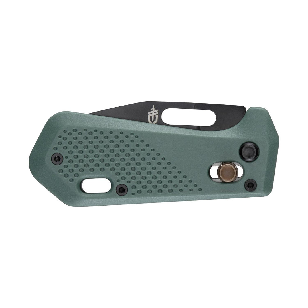 Gerber Nectar knife closed, showing the sage green scale, pocket clip and sword-and-shield logo, side view