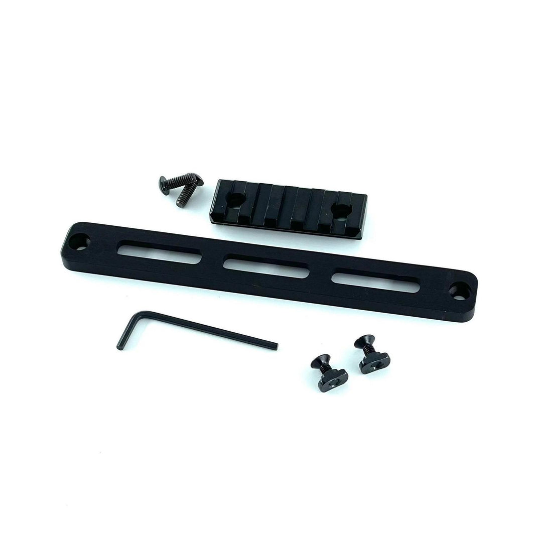 Nieload MDT Oryx M-LOK Picatinny rail kit, flat-lay with the slotted rail bar horizontal, the Picatinny section above it and the hex key and fixings alongside