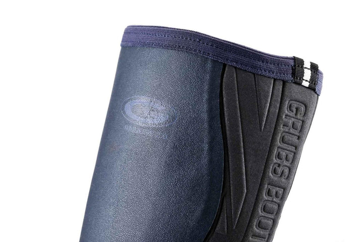 Side view of the upper shaft of a navy Grubs Rainline 2.0 wellington boot with Grubs logo and reflective strap