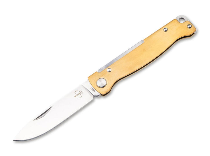 Böker Plus Atlas Brass folding knife with brass handle and satin drop-point blade open, side view on white