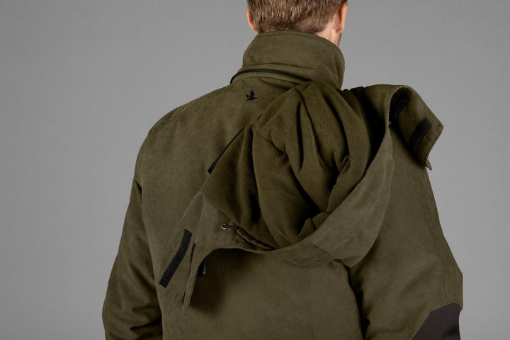 Close-up of the back yoke and collar of the Seeland Taiga jacket, worn with the hood down