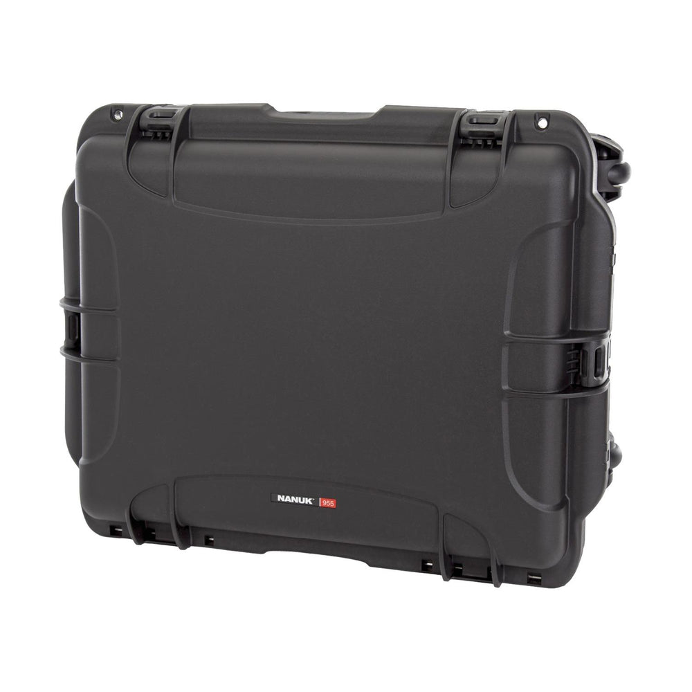 NANUK 955 hard case closed, three-quarter view showing the lid profile, PowerClaw latches, side handle and wheels.