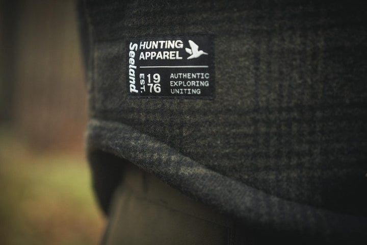 Close-up of the woven Seeland 'Hunting Apparel 1976' label stitched inside the Canada Yukon jacket