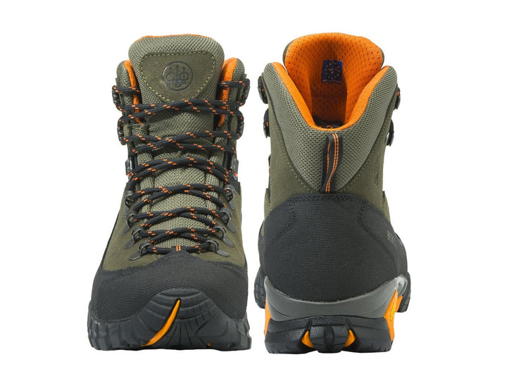 Boots viewed front-on, the right one with its tongue folded open to show the orange mesh lining and padded collar.