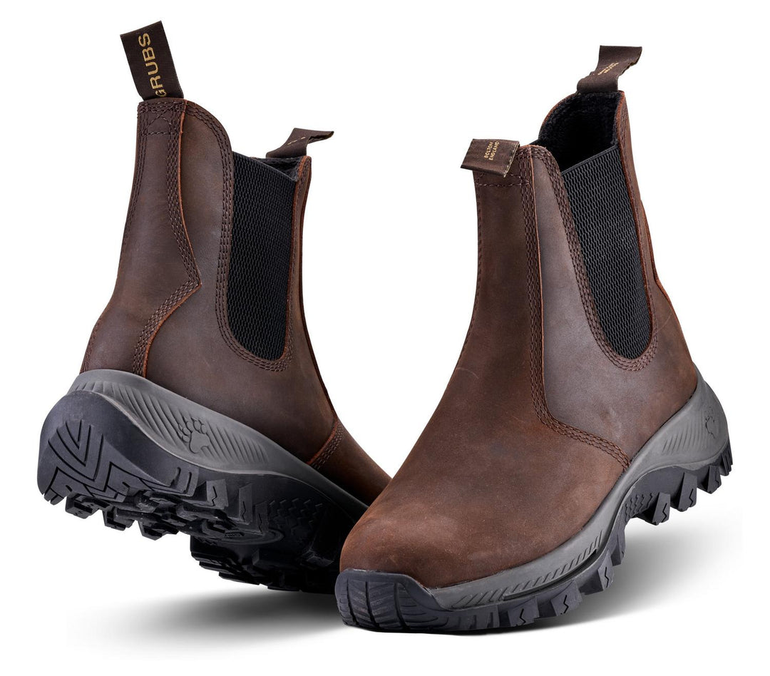Grubs Blizzard waterproof leather dealer boots in dark brown leather with black elastic gussets and chunky black sole, pair three-quarter view