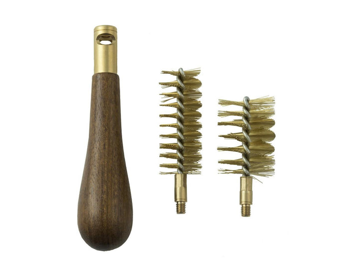 Beretta choke brush contents out of the pack on white: the shaped walnut handle with brass ferrule beside two brass bristle choke brushes of different diameters.