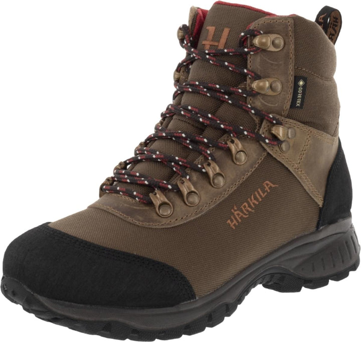 Harkila Wildwood 2.0 GTX women's walking boot in mid brown nubuck and textile, three-quarter front view with Gore-Tex tab, red-flecked laces and rubber toe bumper.
